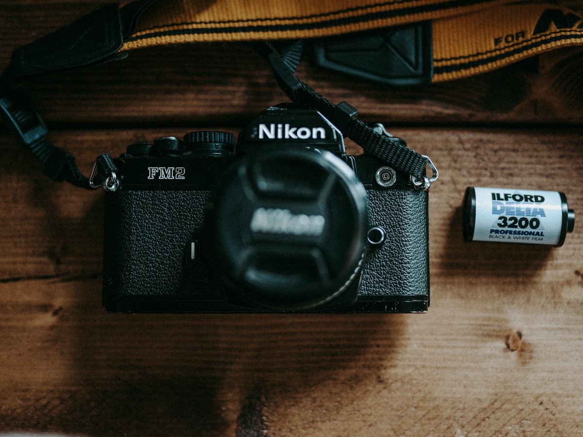 Digital camera with film rolls