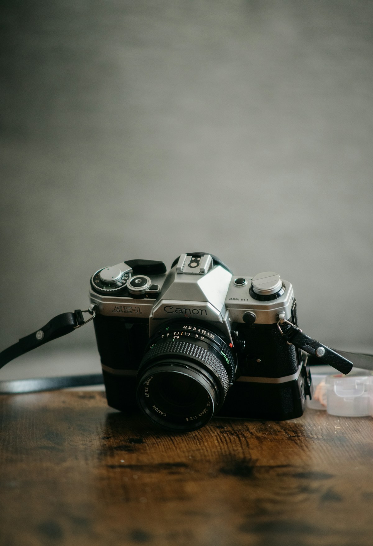 Vintage film camera on a wooden table